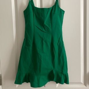 by the way. | Green dress w/ low cut back |